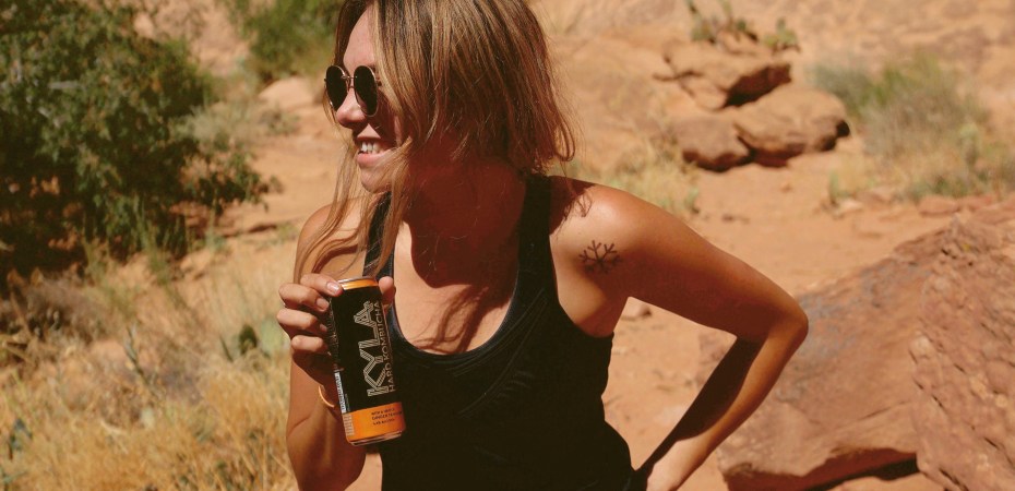 Drinking KYLA Kombucha in the Moab desert.
