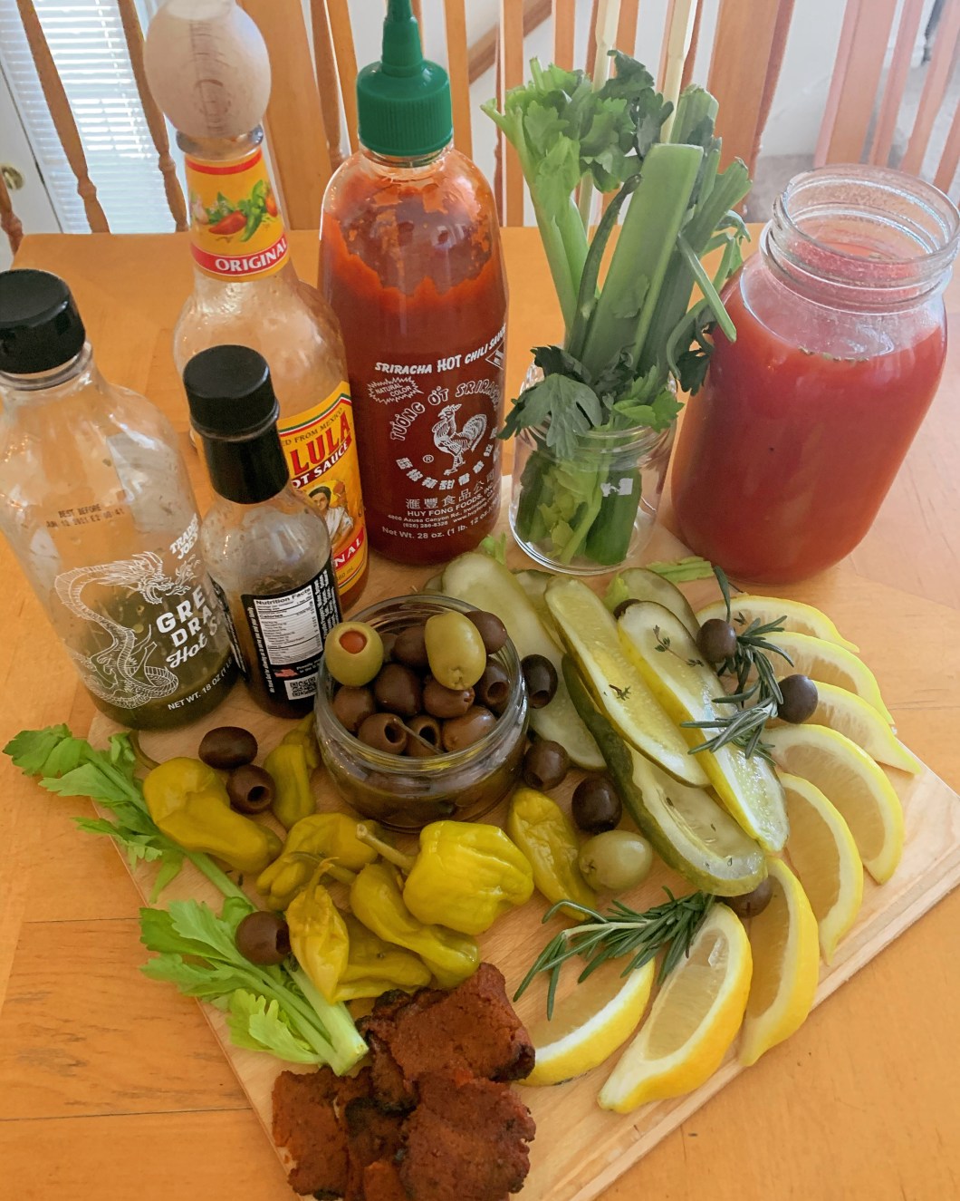Plant-Based Bloody mary : pepperochinis, olives, lemons, vegan bacon, celery, hot sauce