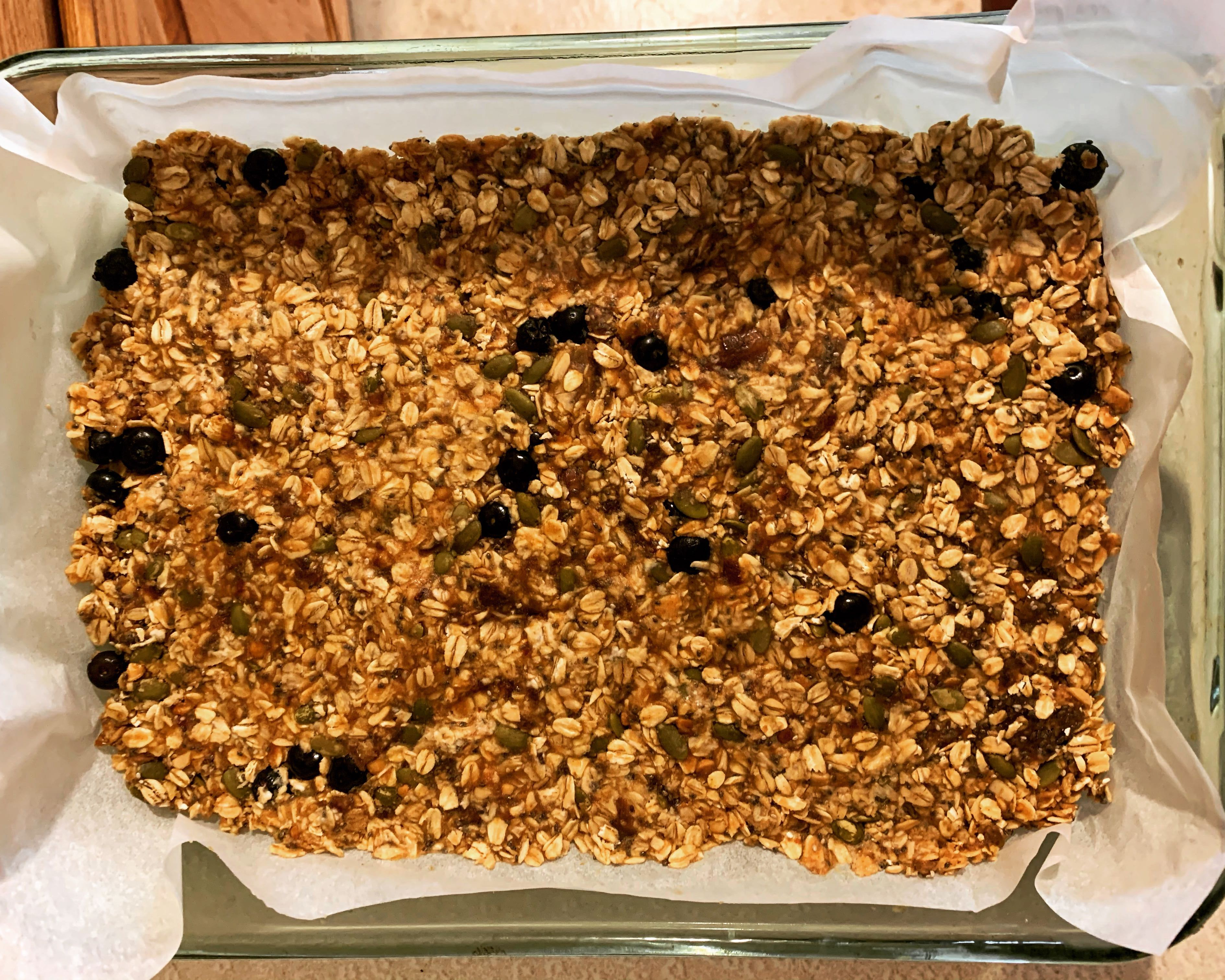 blueberry lemon granola bars in a pan
