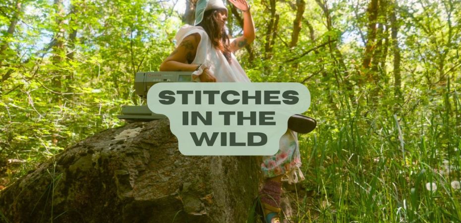 stitches in the wild - a short film about sewing in nature with seamstress and outdoor enthusiast AJ Cutler - woman sitting on a rock next to a sewing machine with grasses and shrubs around her